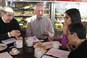 From left, Councilman Joe Gebbia, Councilman Jim Eyre, Maria Duarte and Irma Walker meet for breakfast to discuss ways to engage Brookhaven’s Spanish-speaking residents.