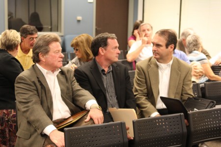 Henly Shelton, Sam Eads and Jim Riticher, left to right, attend the Dunwoody City Council meeting July 22. The three announced  they plan to run for seats on the council.