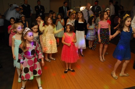 Girls decked out in brightly colored party dresses for the Father-Daughter Dance at the Marcus Jewish Community Center of Atlanta on March 23.