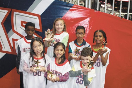 Sarah Smith Elementary School students were honored before a recent  Atlanta Hawks game for reading more than 1,000 minutes during a two-week period. Grade level winners were: Alaric Rodriguez, kindergarten; Anjini Naidu, first grade; Tuesday Blobaum, second grade; Lena Hoover, third grade; Ashley Redhead, fourth grade; and Tabitha Randklev, fifth grade.