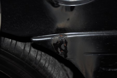 Damage sustained to the gas cap of a Sandy Springs police car on June 29. 