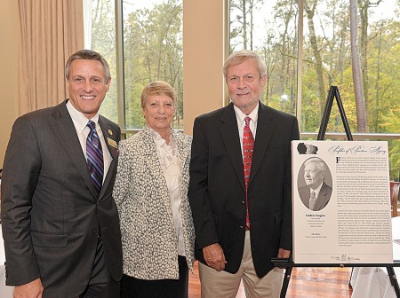 Linden Longino, right, was honored by LeadingAge Georgia as an example of “positive aging” and for his longtime leadership of International Paint Pals. Joining him, at left, Chris Keysor, president and CEO of Lenbrook, a resident senior community in Buckhead, and Jackie Durant, also of Lenbrook.
