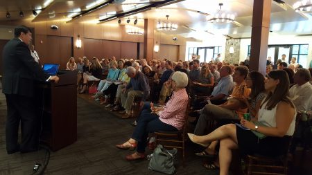 Sandy Springs Mayor Rusty Paul welcomes a crowd of 150 residents to the Next Ten planning presentation July 20 at Heritage Hall. (Photo John Ruch)