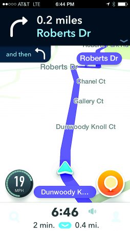 A screenshot of the Waze app directing a driver down Dunwoody Knoll Drive in Dunwoody.
