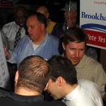 Brookhaven YES supporters await voting results from DeKalb County at Pub 71 on July 31.