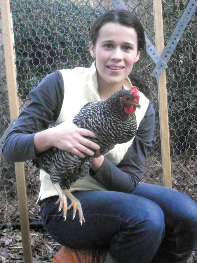 Caroline Phillips with one of her chickens