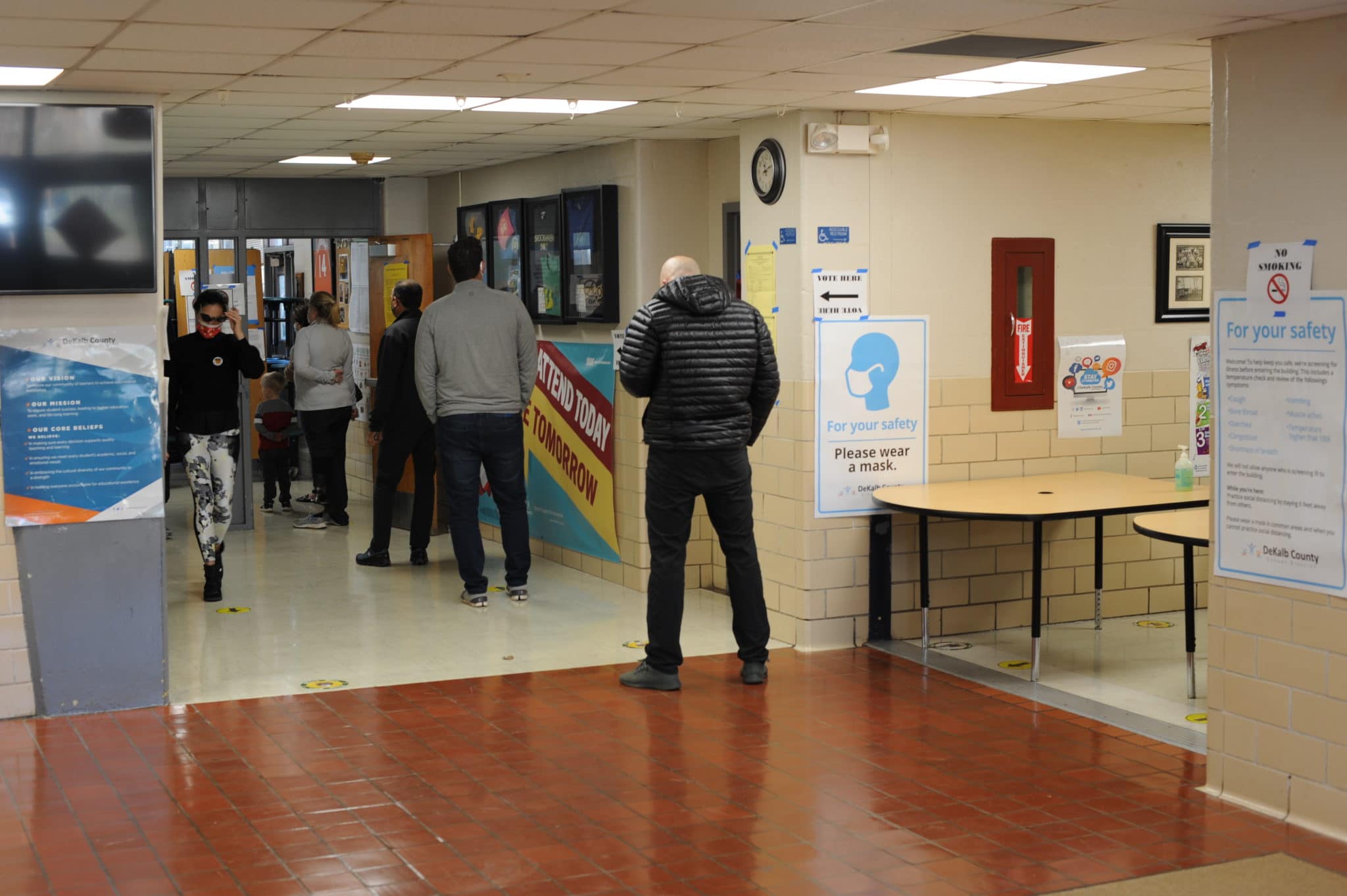 Voters line up at the polling place at Ashford Park Elementary School in Brookhaven.