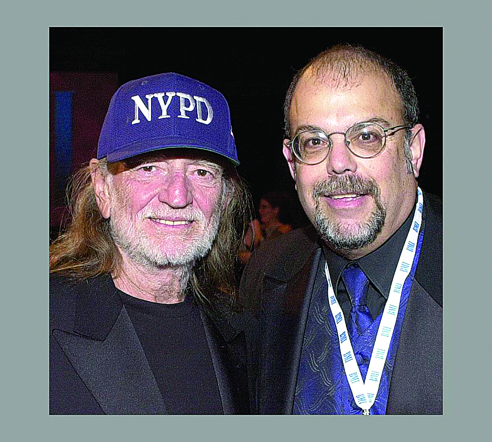 Willie Nelson (L) and Rick Diamond