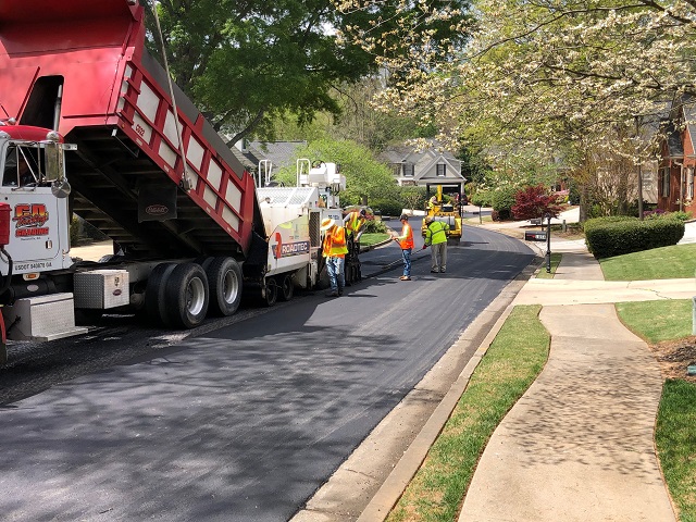 Norcross finalizes business tax hike, awards street paving contract