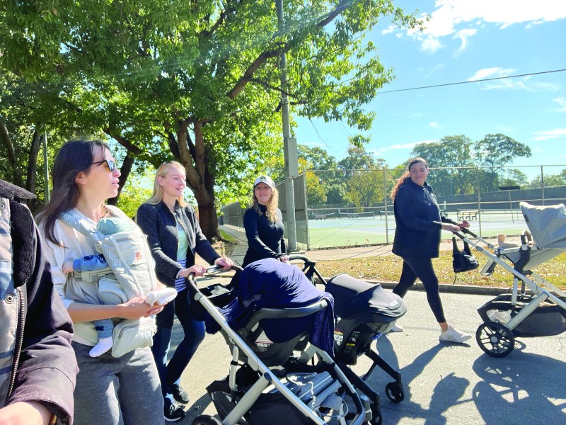 A stroller walk comprised of members of the group MESH Moms.