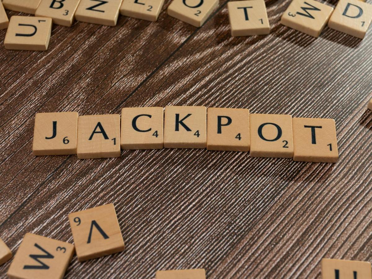 the word jackpot spelled out in scrabble letters