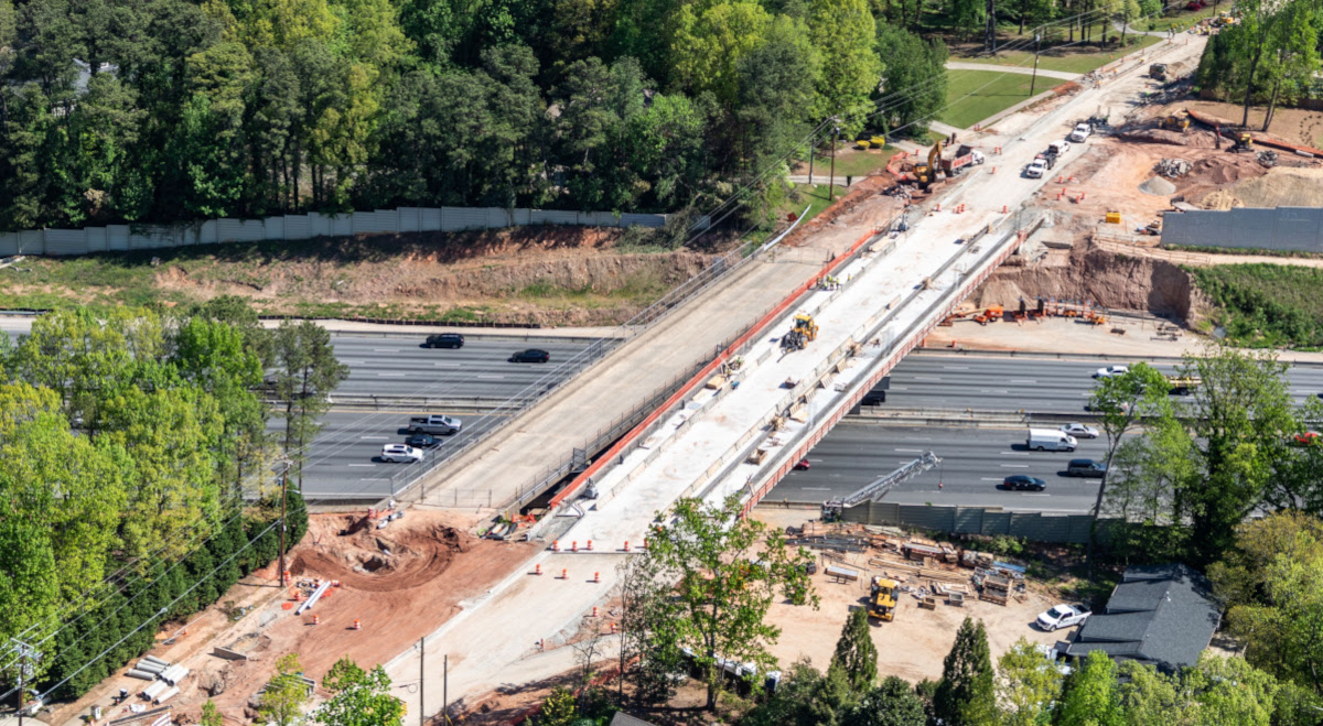 Construction of the new Mt. Vernon Highway bridge neared completion with an opening date set for April 22.