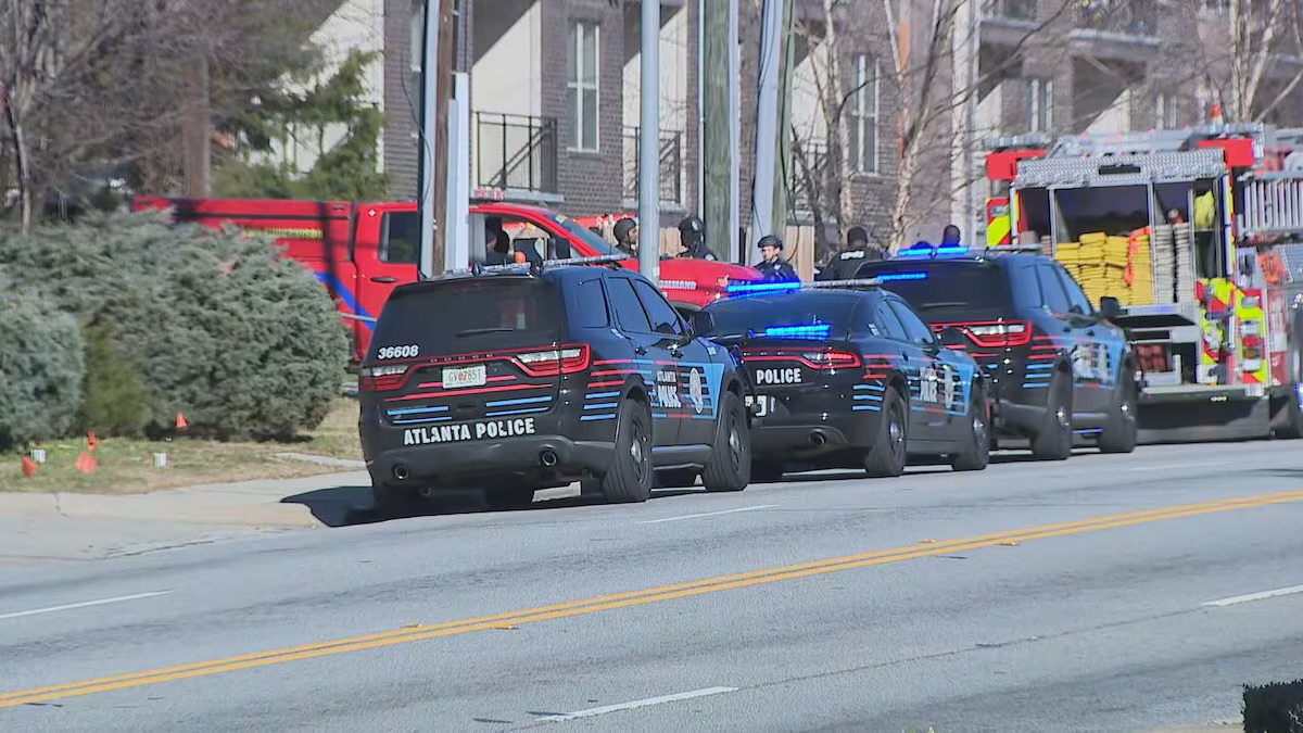 Gunman barricaded inside apartment opened fire, injuring 2 Atlanta officers